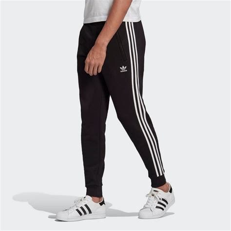 schwarze adidas hose mit schwarzen streifen|adidas Originals ADICOLOR 3.